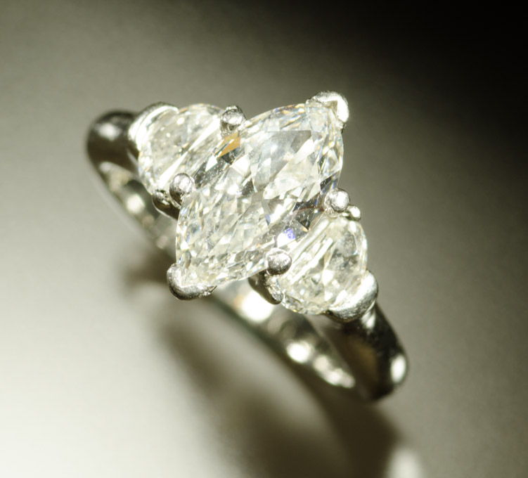 Appraisal: ESTATE DIAMOND AND PLATINUM RING with Packouz Jewelers appraisal The