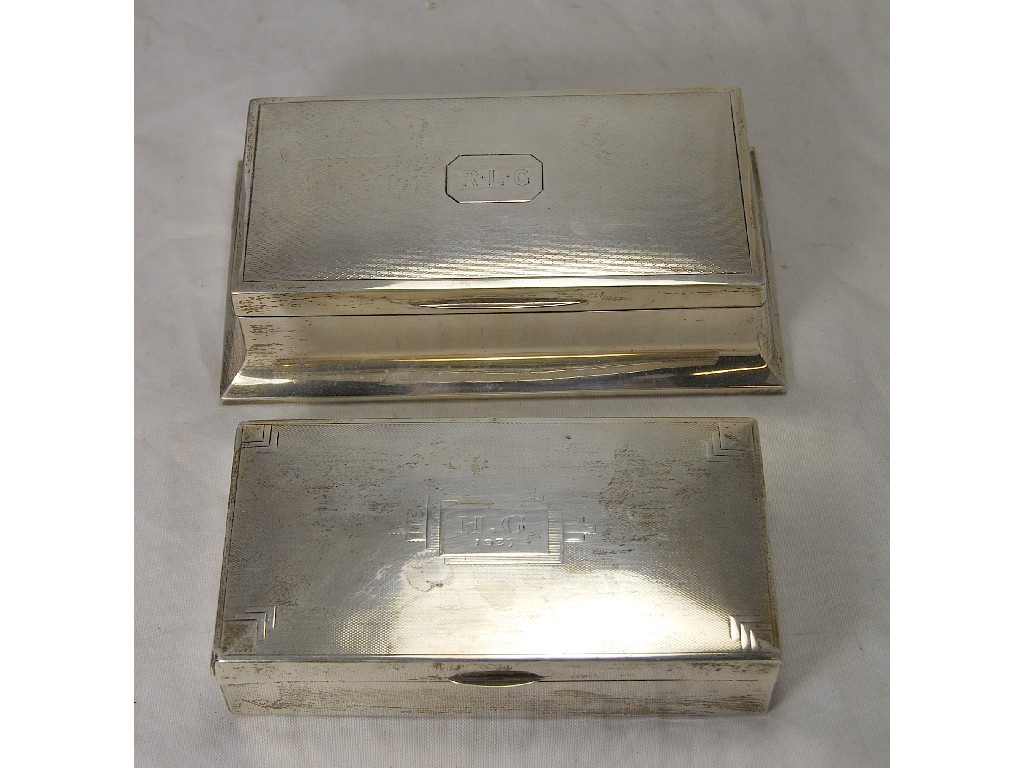 Appraisal: Two rectangular engine turned silver cigarette boxes cedar lined x