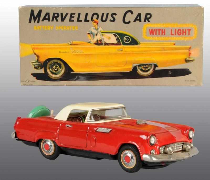 Appraisal: Tin Marvelous Car Battery-Operated Toy Description Japanese Working Made by