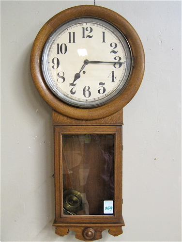 Appraisal: AN AMERICAN OAK REGULATOR WALL CLOCK E Ingraham Clock Co