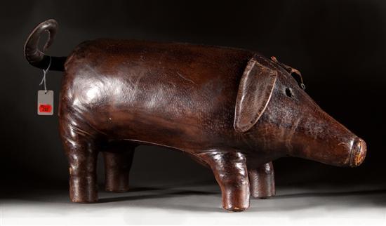 Appraisal: English leather pig-form foot rest with applied floppy ears and