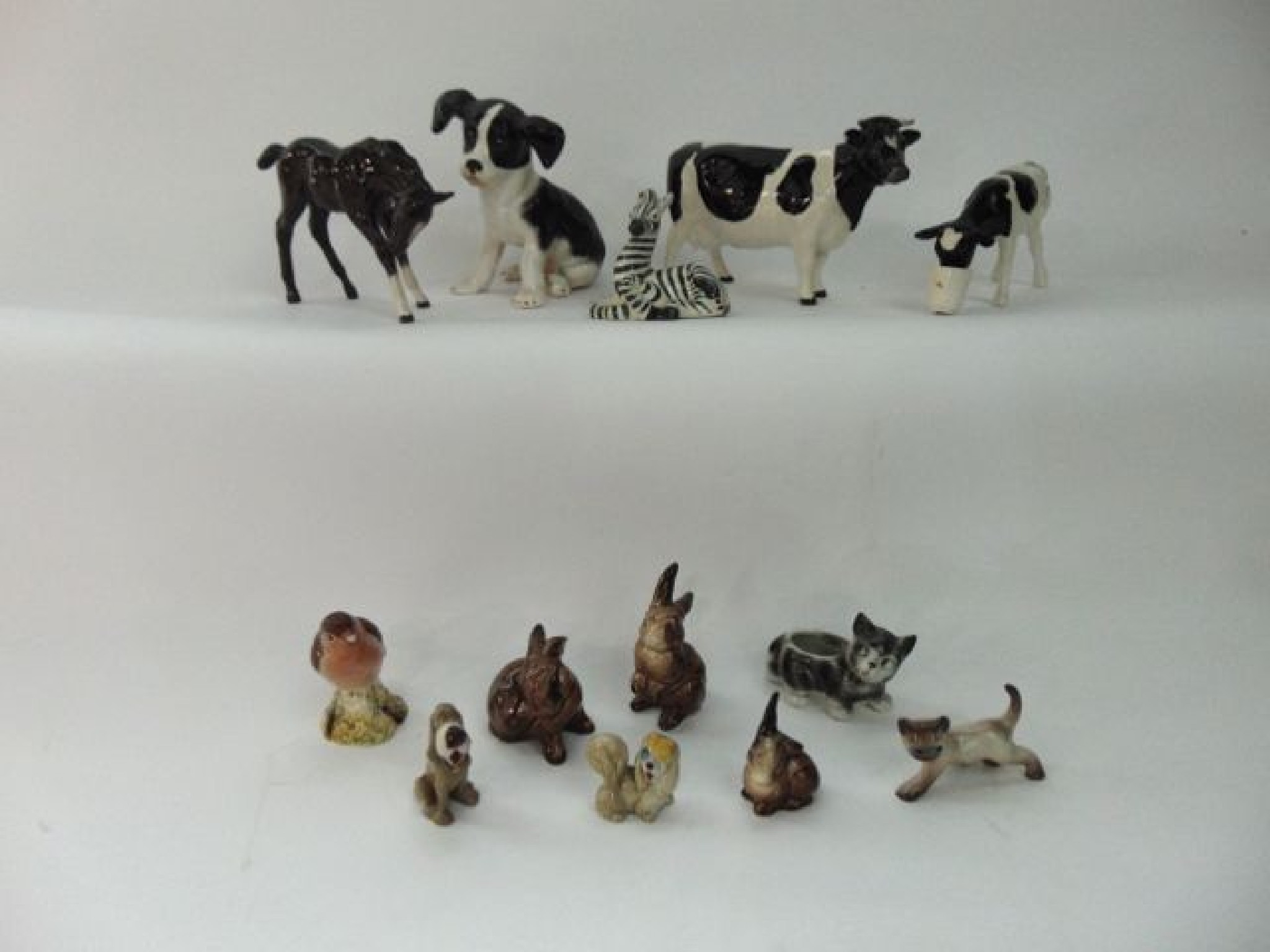 Appraisal: A Beswick model of a Friesian cow a Beswick style