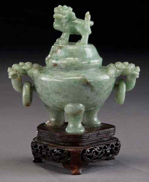 Appraisal: Chinese Qing carved jadeite censer with a foo dog finial