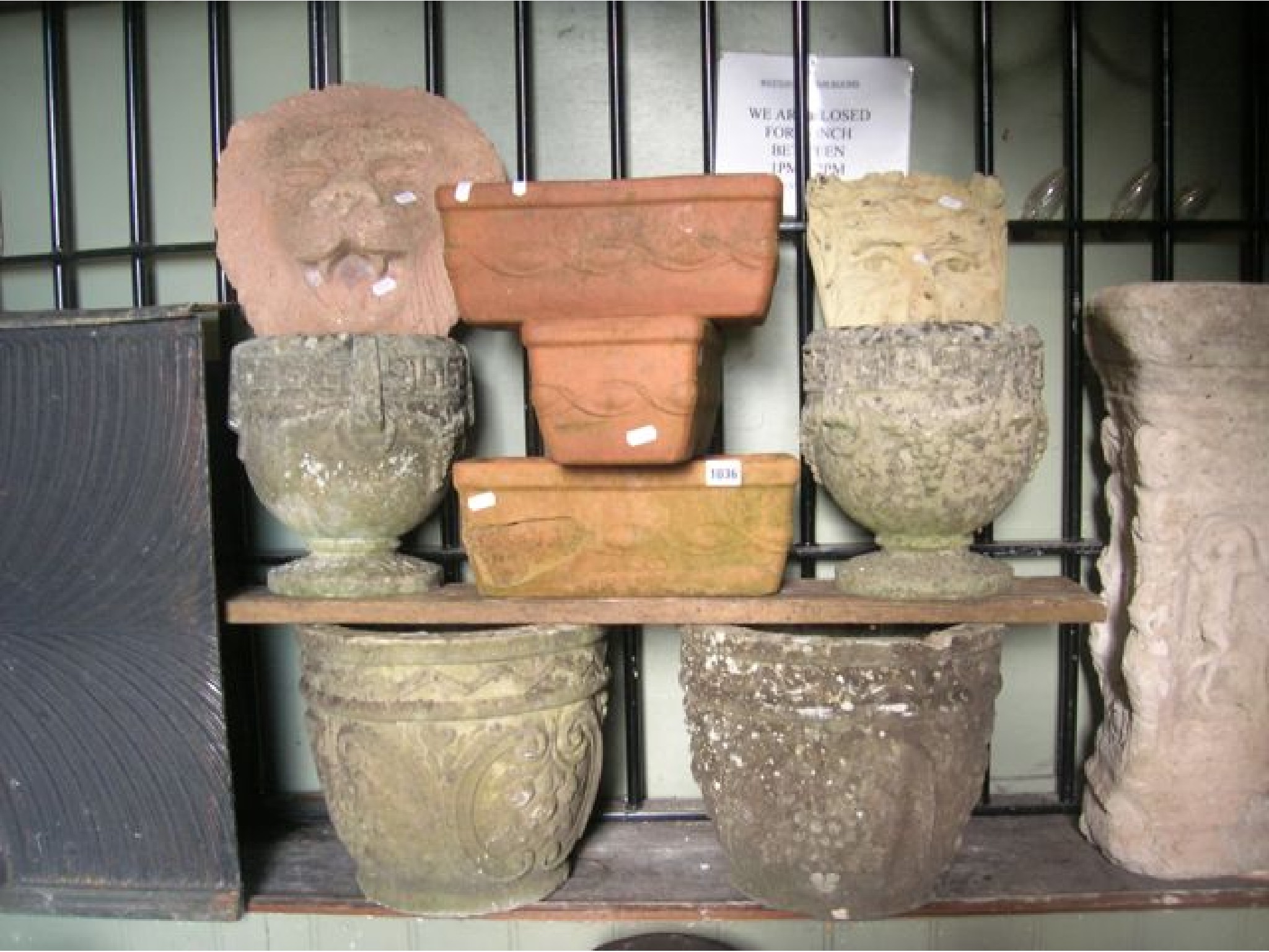 Appraisal: Two small pairs of weathered cast composition stone garden planters