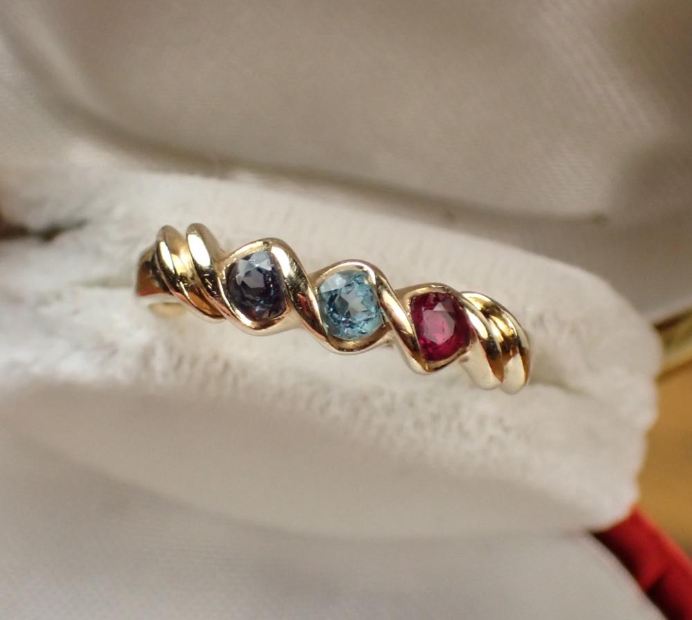 Appraisal: ALEXANDRITE RUBY ZIRCON AND FOURTEEN KARAT GOLD RING set with