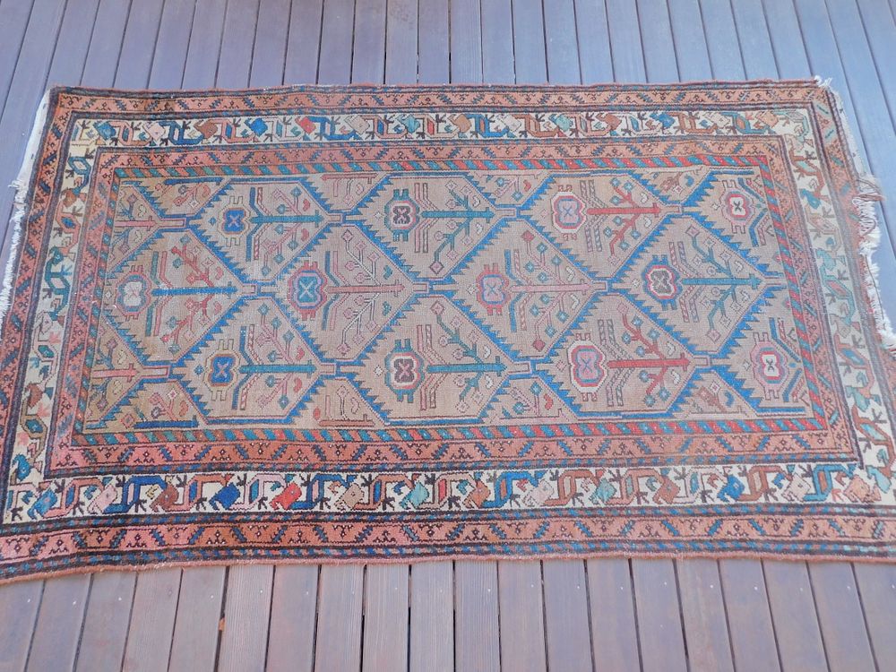 Appraisal: ANTIQUE PERSIAN SCATTER RUG Antique Persian scatter rug in camel