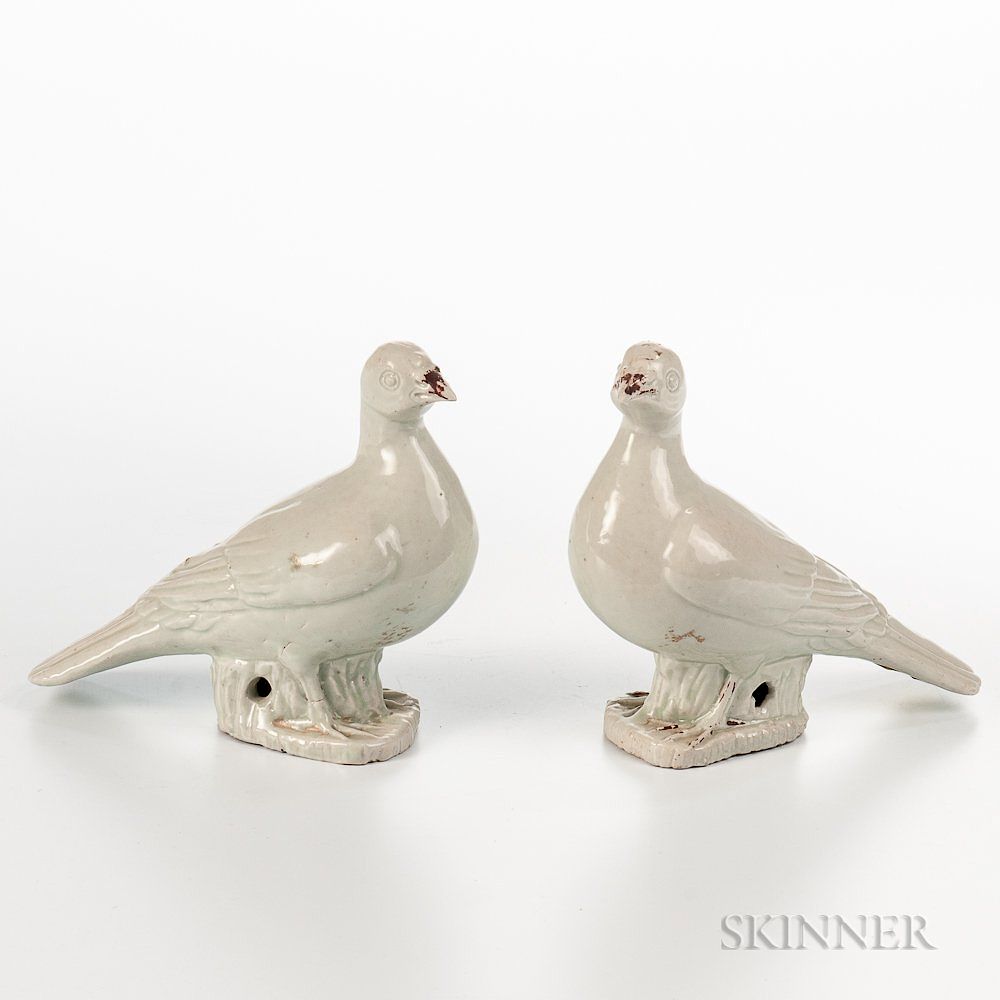 Appraisal: Pair of Doves Pair of Doves China each standing on