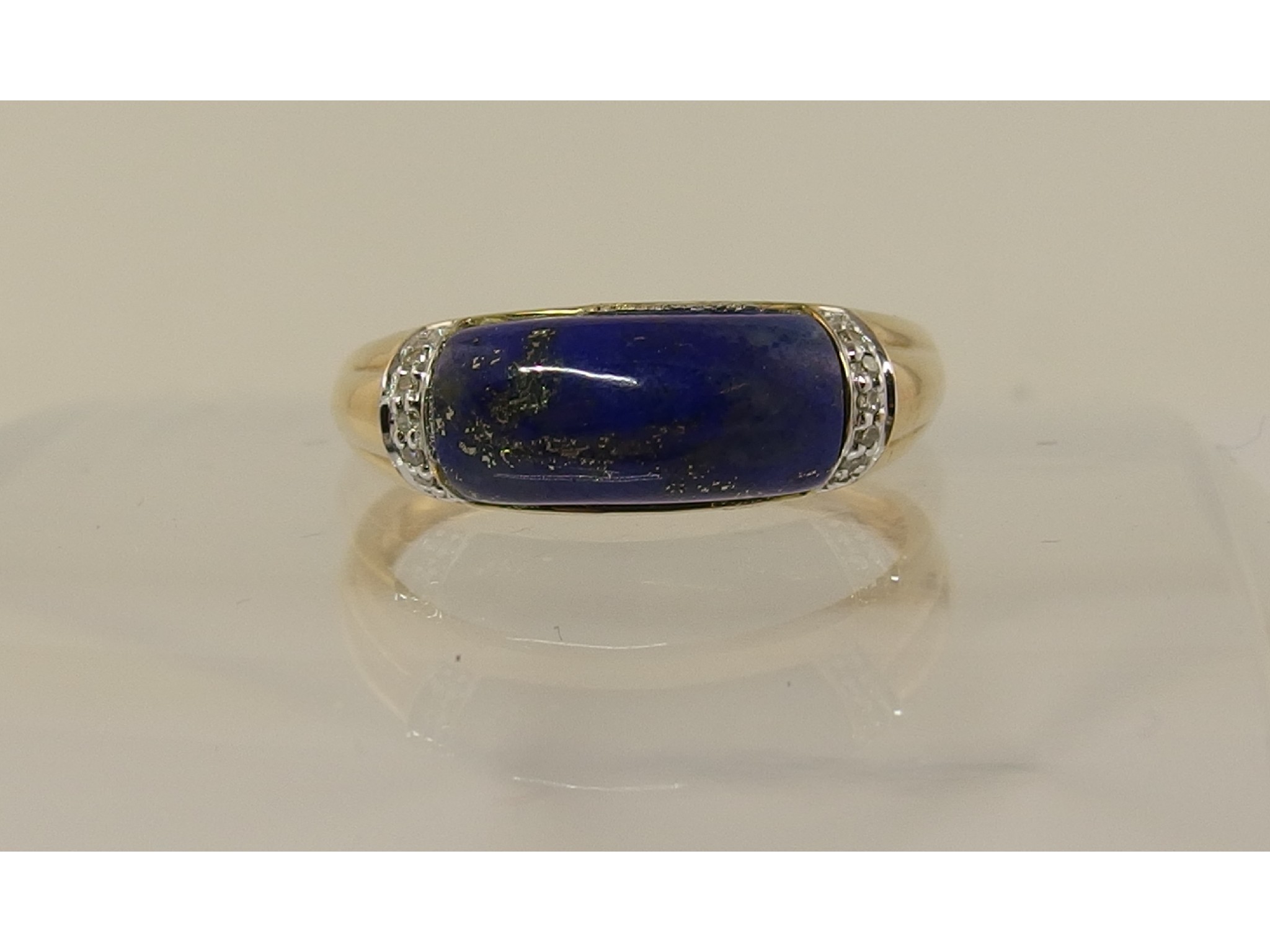 Appraisal: A ct gold lapis lazuli and diamond ring