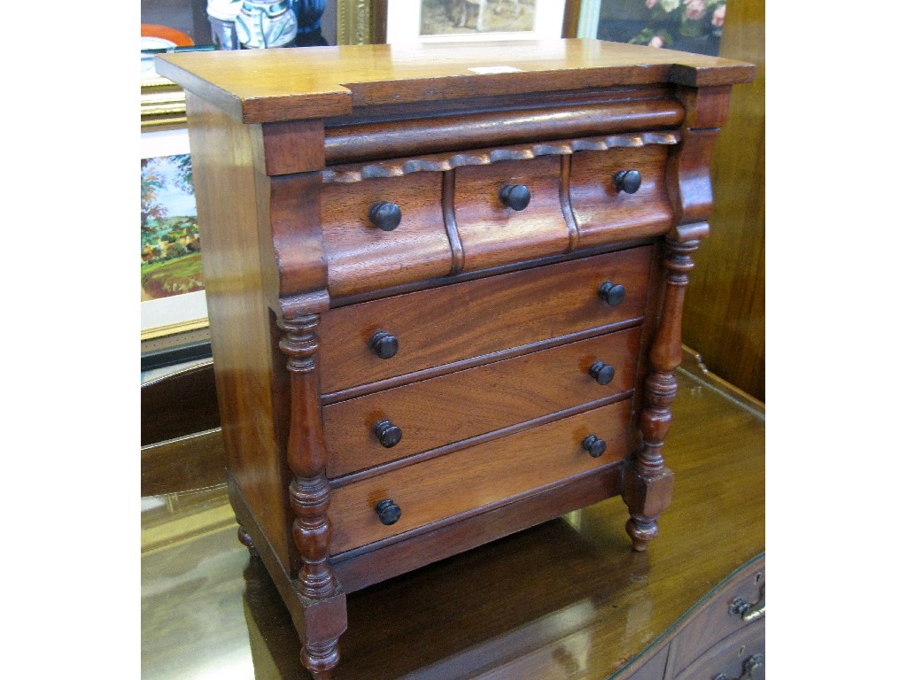 Appraisal: Mahogany apprentice ogee column chest