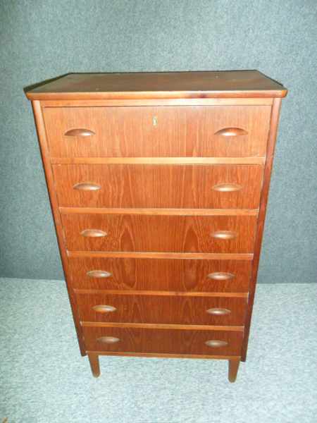 Appraisal: A DANISH TEAK CHEST OF DRAWERS of six long drawers