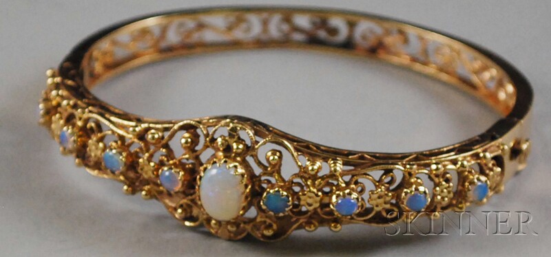 Appraisal: kt Gold and Opal Bangle Bracelet total dwt interior cir