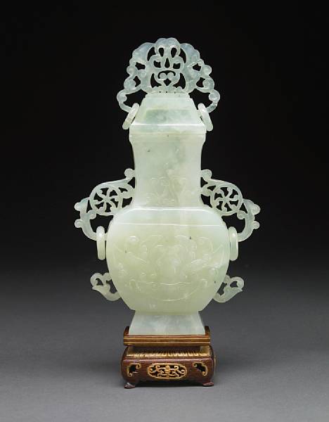 Appraisal: Carved Serpentine Vase Of traditional form decorated with typical Chinese