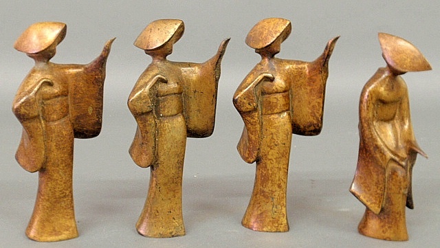 Appraisal: - Set of four Asian bronze robed figures three shown