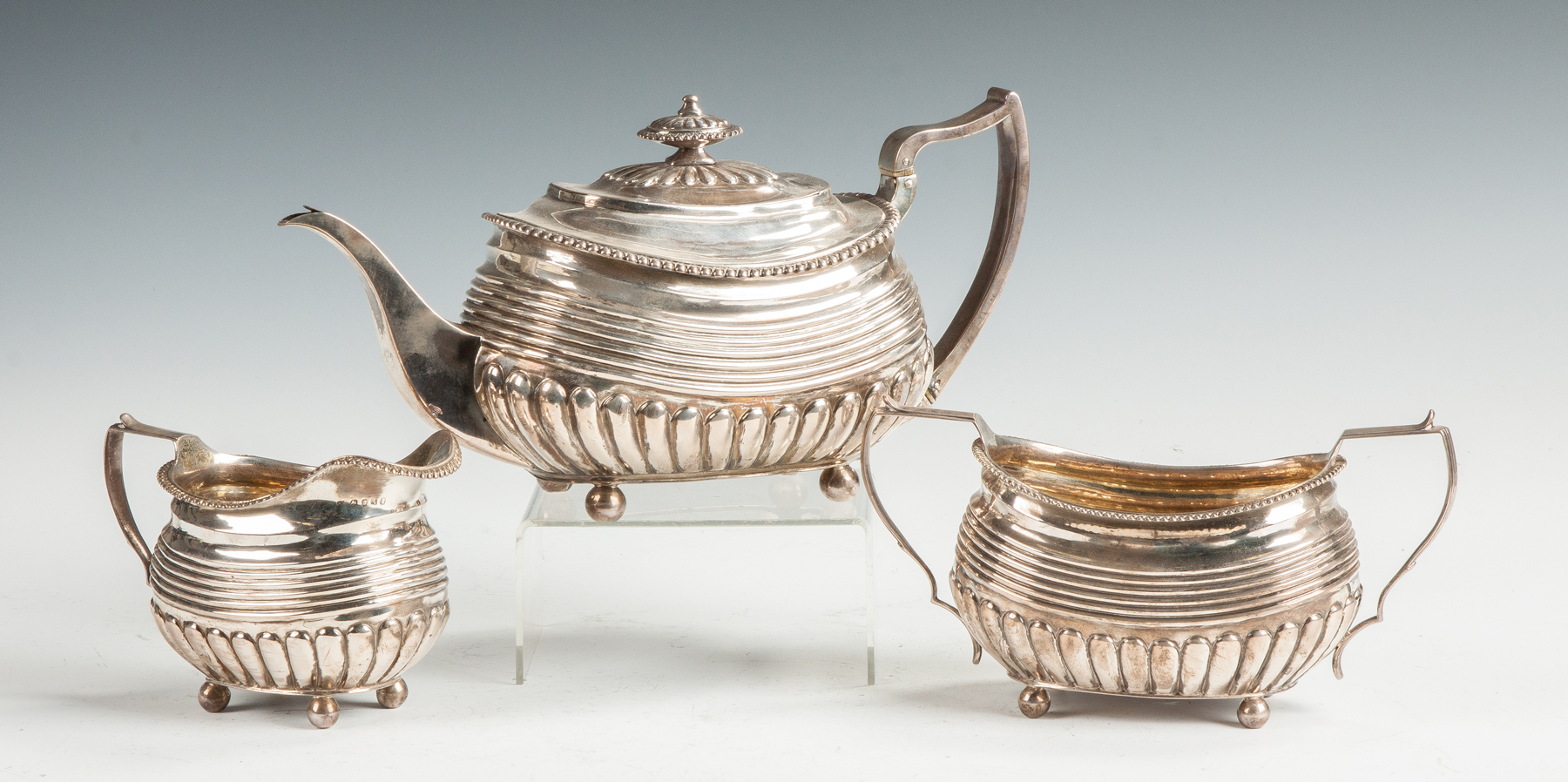 Appraisal: Samuel Hennell Silver -Piece Tea Set London C Lobed ribbed