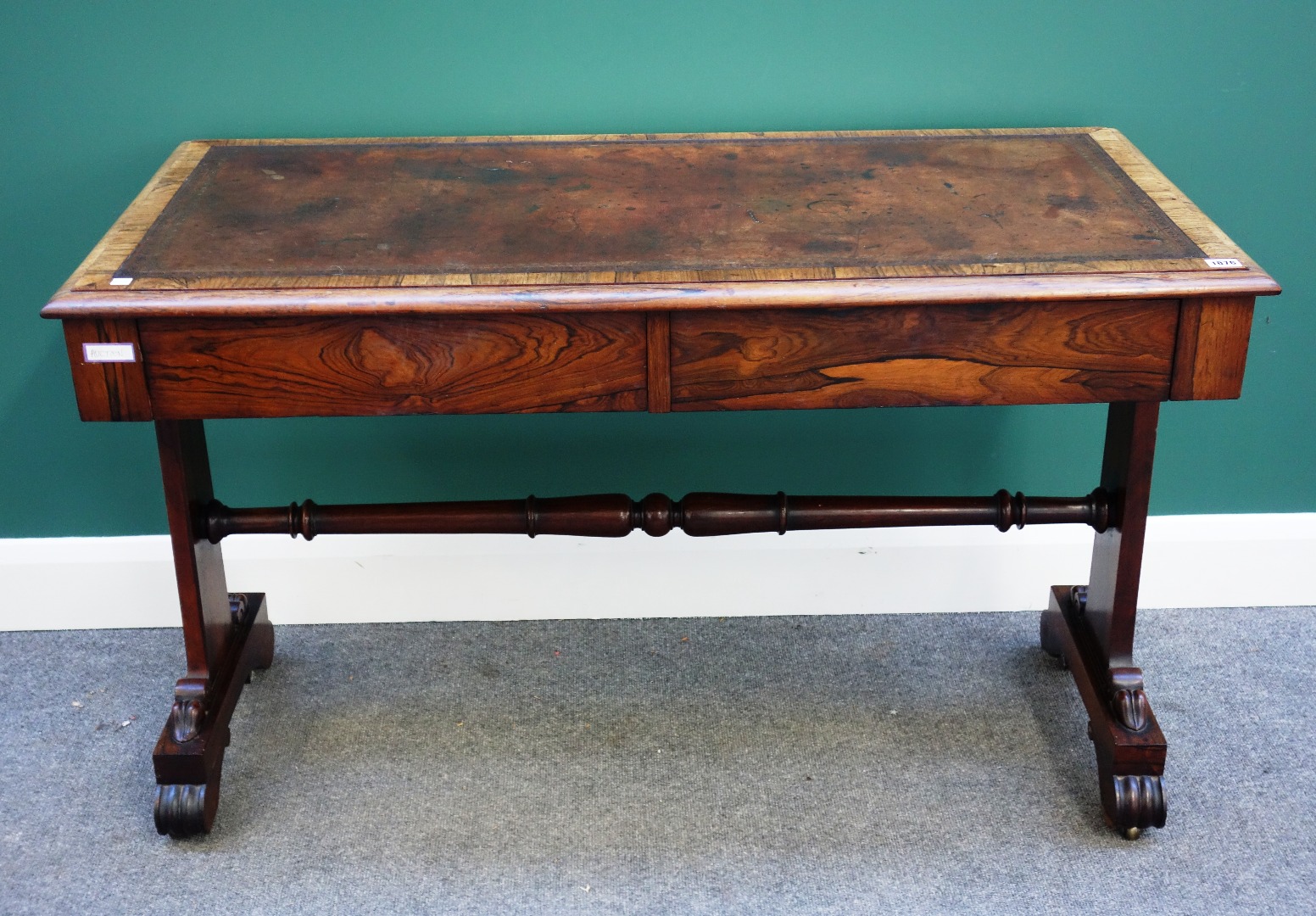 Appraisal: A William IV rosewood library table the rectangular leather inset