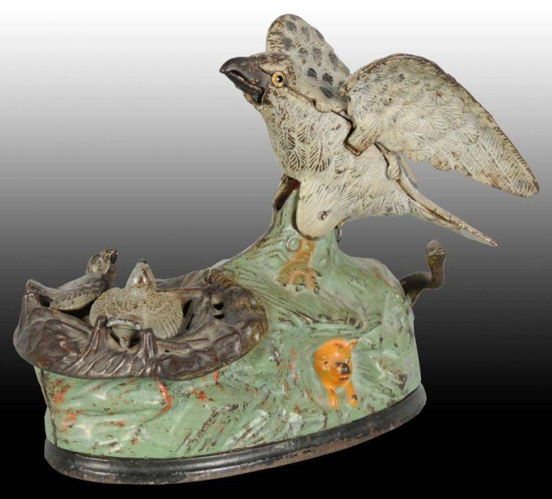 Appraisal: Cast Iron Eagle Eaglets Mechanical Bank Description Manufactured by J