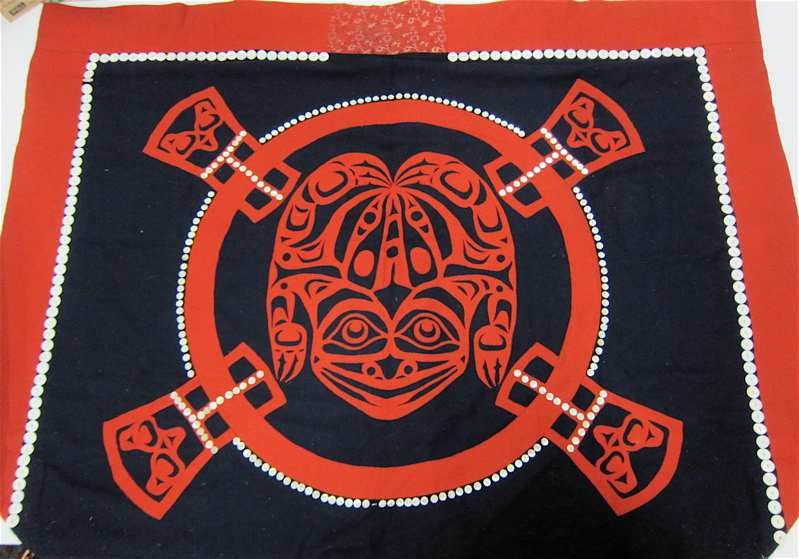 Appraisal: NORTHWEST COAST BUTTON BLANKET red applique totemic frog figure and