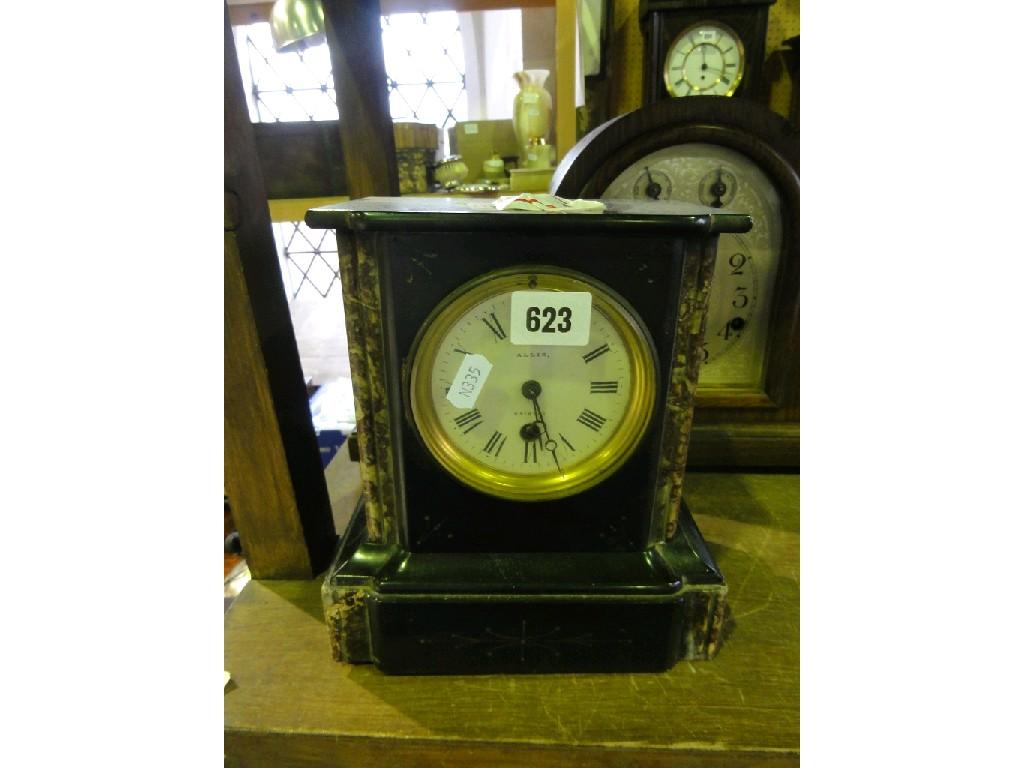 Appraisal: A late th century marble and black slate marble clock