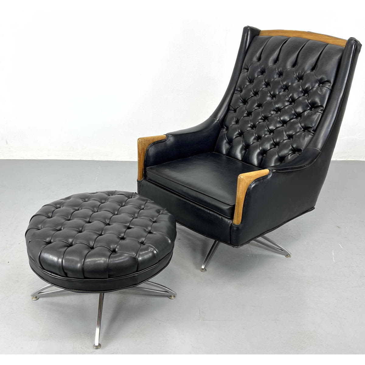 Appraisal: KROEHLER Lounge Chair and Ottoman Black tufted with wood handles