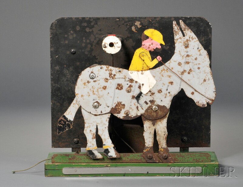 Appraisal: Cast Iron Jockey and Donkey Carnival Arcade Target America early