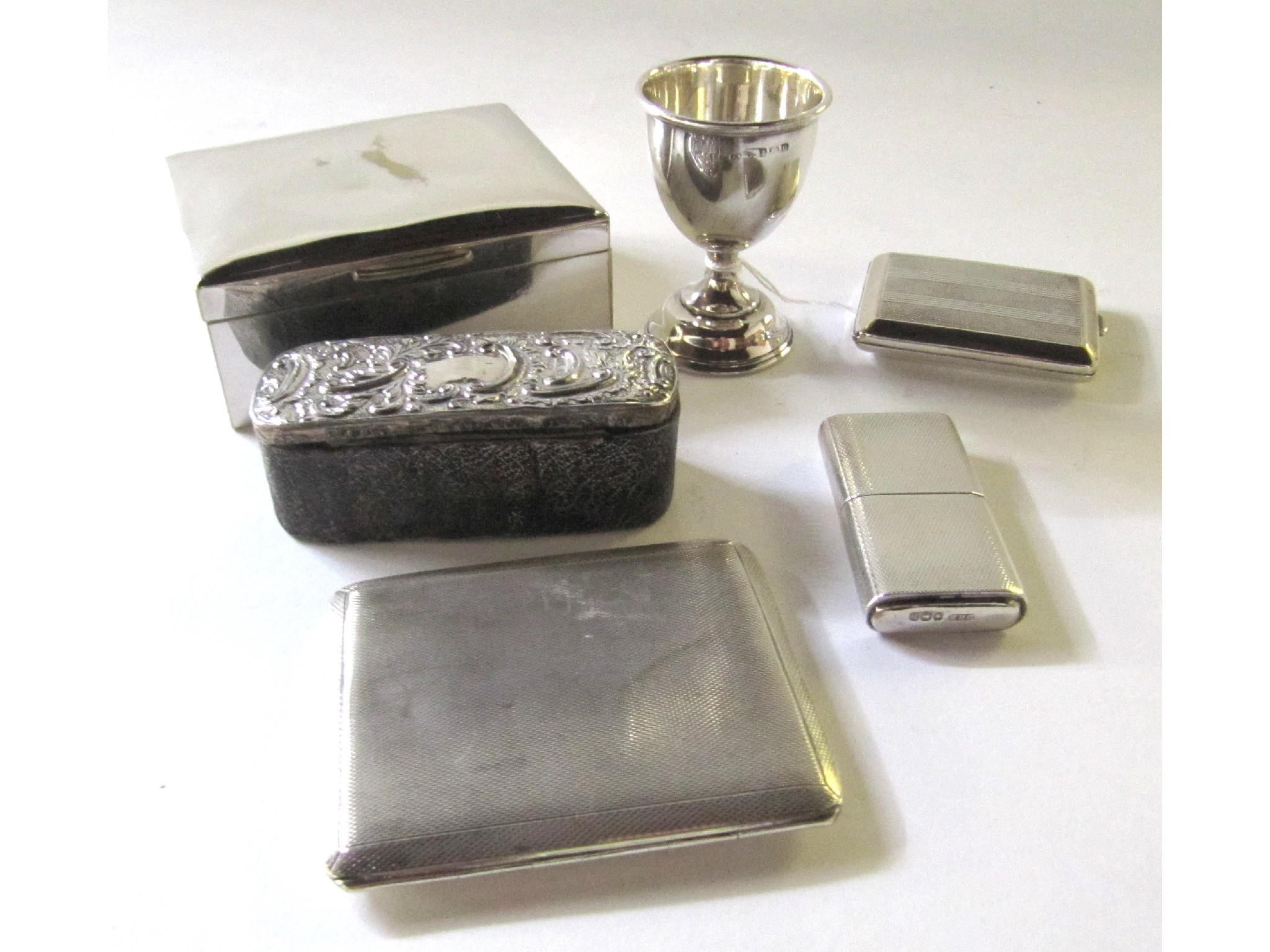 Appraisal: A lot comprising a white metal cigarette box a silver