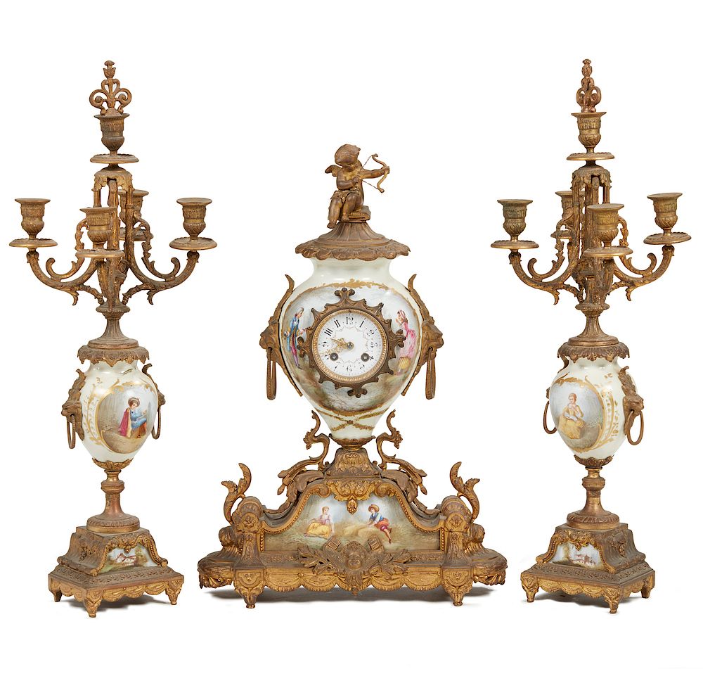 Appraisal: -Piece Victorian Clock Garniture Three piece Victorian gilt bronze clock