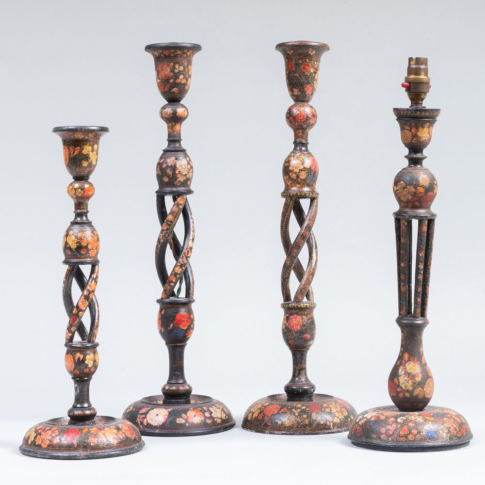 Appraisal: Group of Four Continental Lacquered Candlesticks Each drilled for electricity