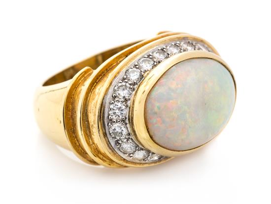 Appraisal: Sale Lot A Yellow Gold Opal and Diamond Ring containing