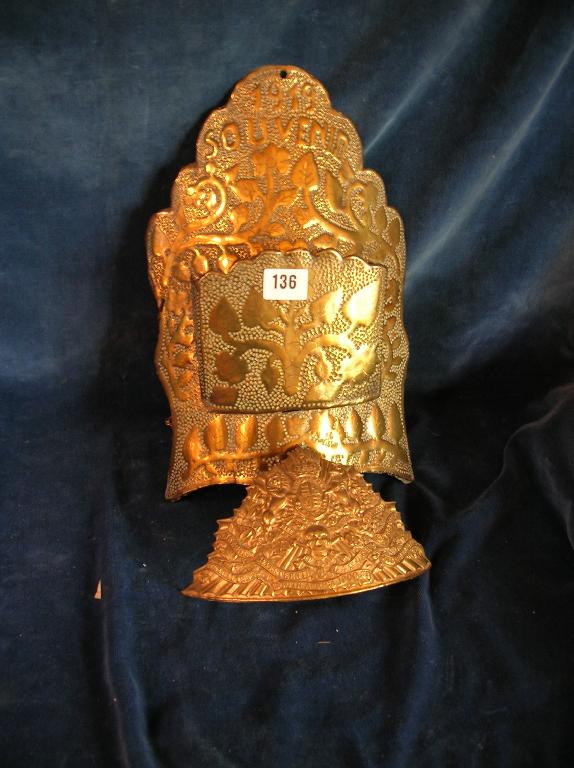 Appraisal: An embossed brass letter holder marked Souvenir together with a