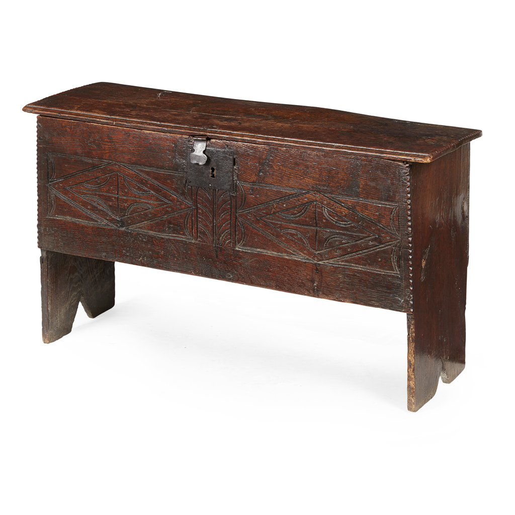 Appraisal: OAK BOARD CHEST TH CENTURY the hinged top above a