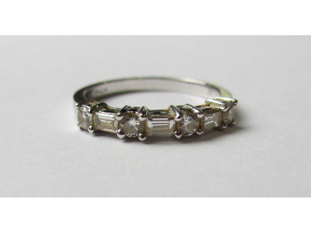 Appraisal: Am eighteen carat white gold baguette and brilliant cut diamond