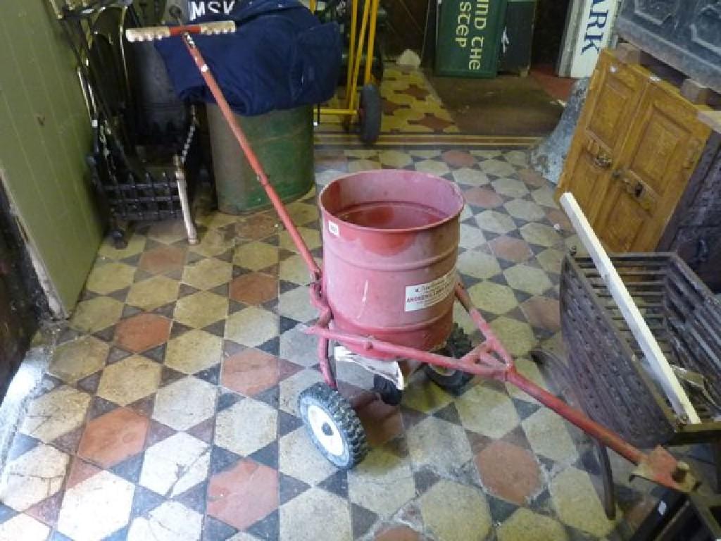 Appraisal: A vintage cyclone spreader together with a Eltex greenhouse heater