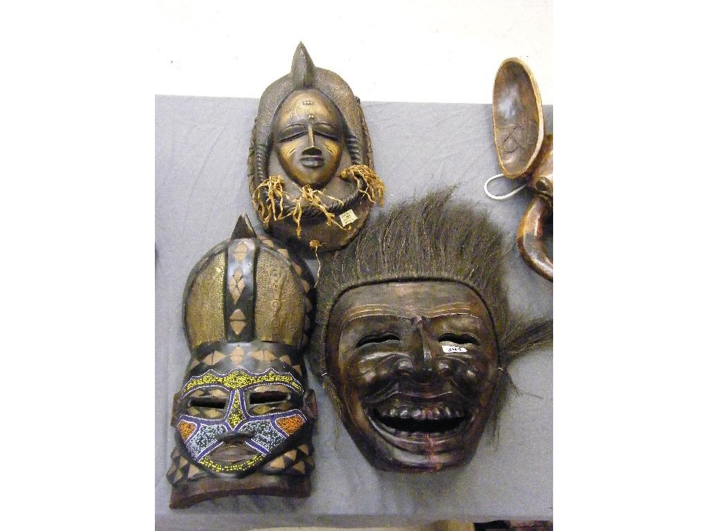 Appraisal: Carved wooden Ivory Coast dancing mask high also two other