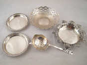 Appraisal: A pierced round silver bonbon dish by Walker and Hall