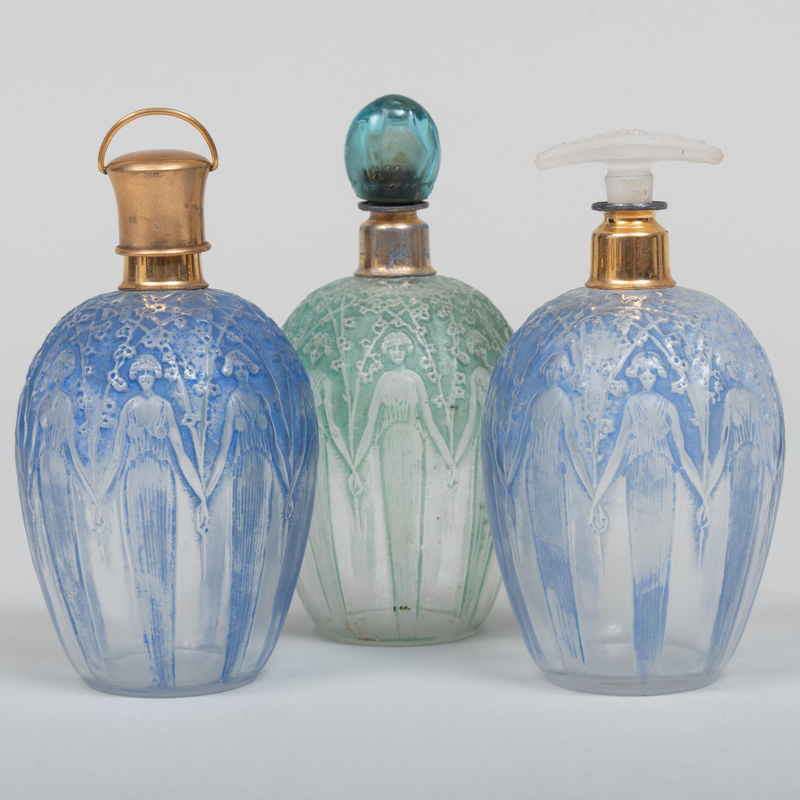 Appraisal: THREE LALIQUE PATINATED GLASS SCENT BOTTLES Molded signature x in