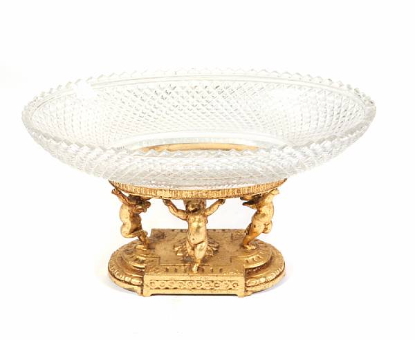 Appraisal: A French gilt metal and cut glass centerpiece height in