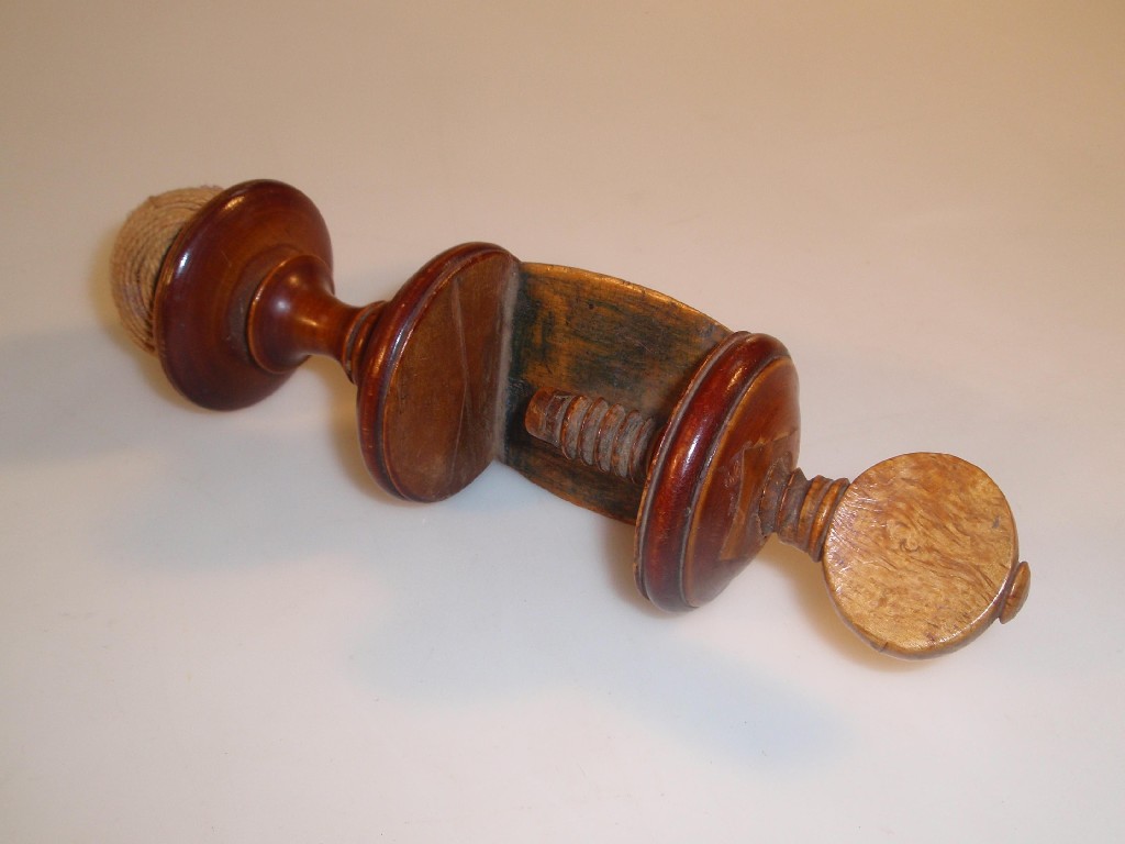 Appraisal: A Victorian treen pin cushion the turned body with screw