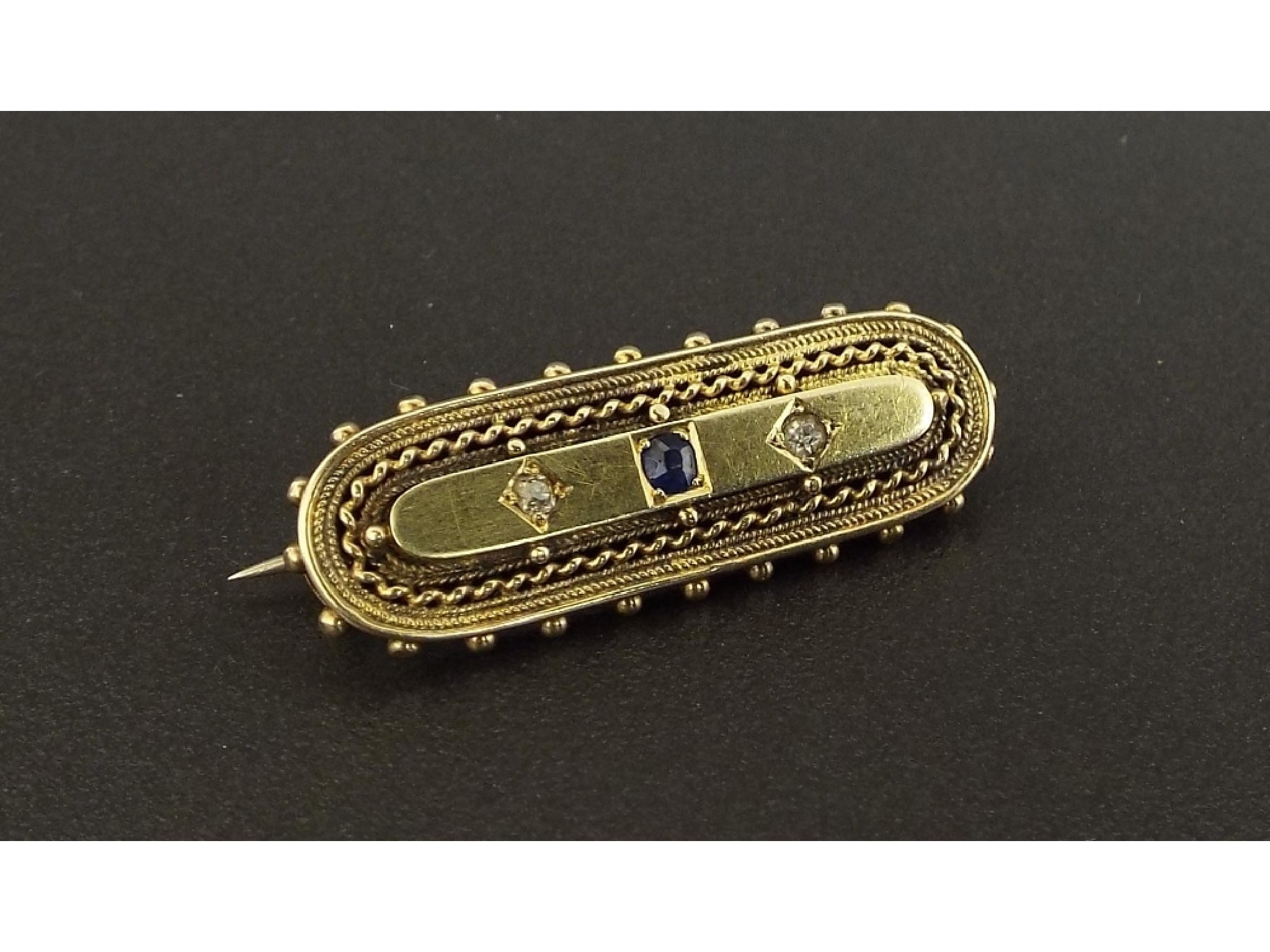 Appraisal: Antique sapphire and paste gold brooch gm mm