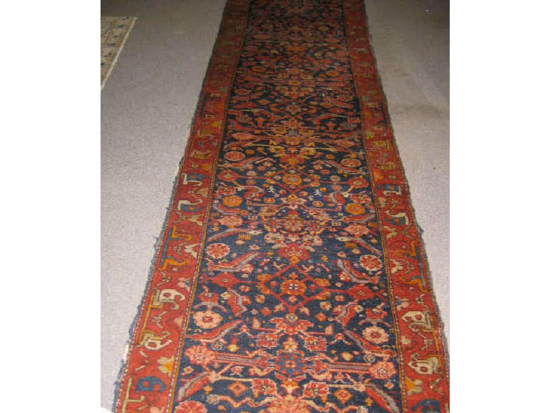 Appraisal: MALAYER RUNNER The indigo field shows an allover herati design