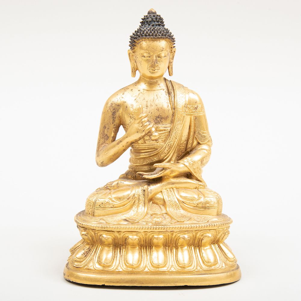 Appraisal: Tibetan Gilt-Bronze Figure of a Seated Medicine Buddha Tibetan Gilt-Bronze