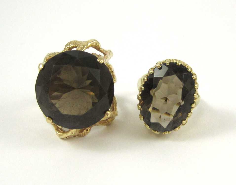 Appraisal: TWO SMOKY QUARTZ AND YELLOW GOLD RINGS including a size