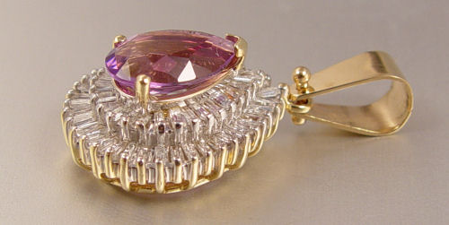 Appraisal: CT AMETHYST AND CTW DIAMOND PENDANT K yellow gold pendant