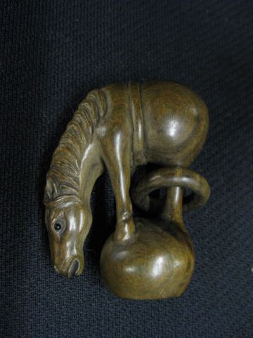 Appraisal: Carved Wood Netsuke of Horse standing on a ball loose