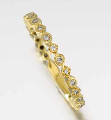 Appraisal: A Ladies' Diamond Band k yellow gold band designed with