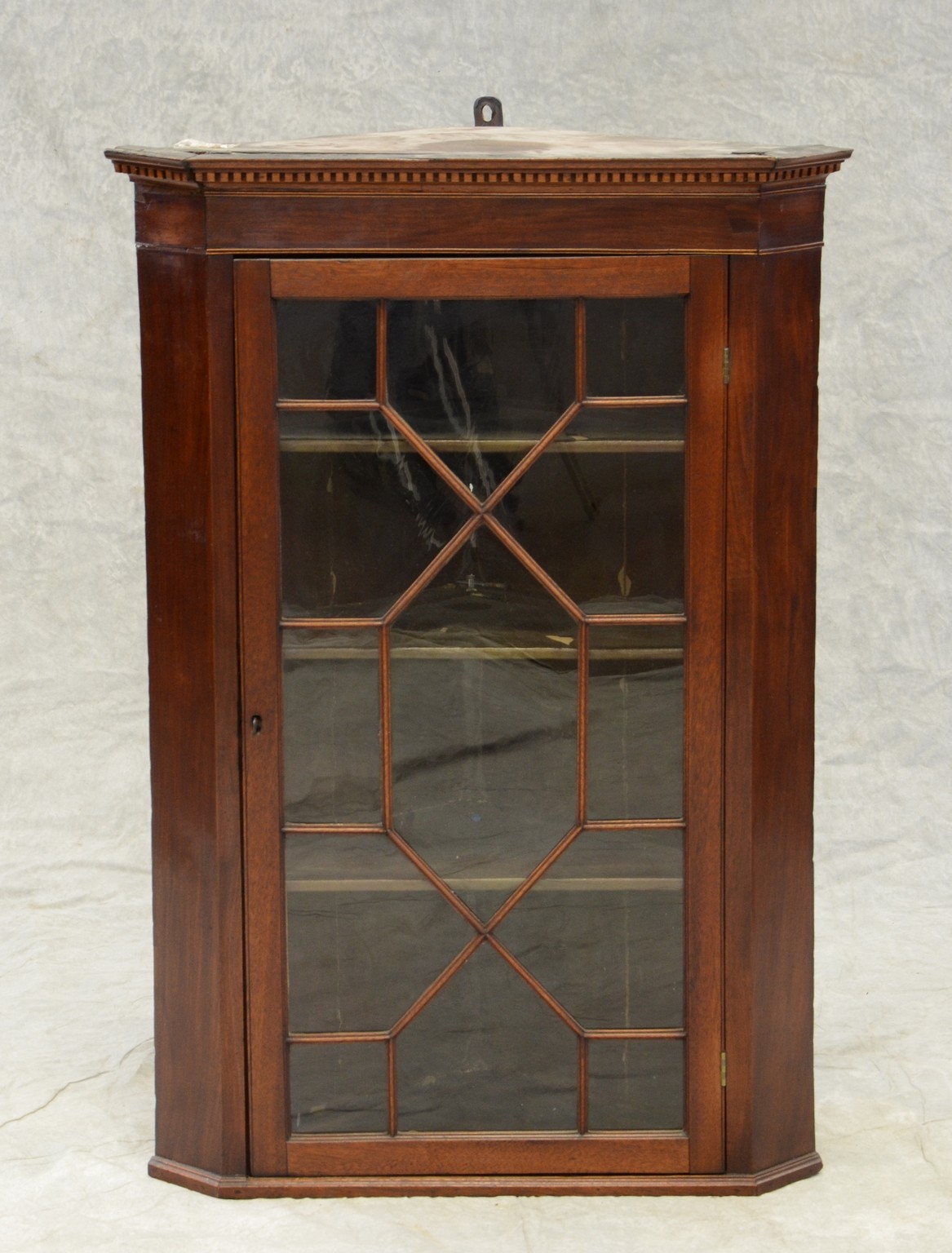 Appraisal: Mahogany hanging corner cupboard single door with individual glazed panels