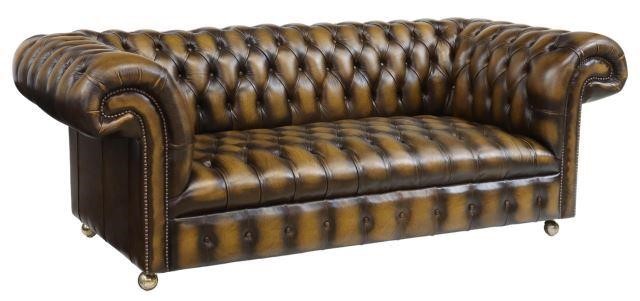 Appraisal: English Chesterfield sofa late th c in brown leather upholstery