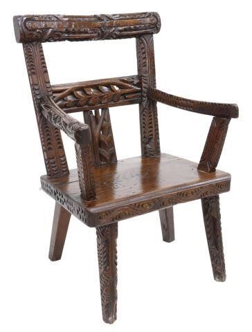 Appraisal: Irish carved oak armchair early th c the primitive heavy