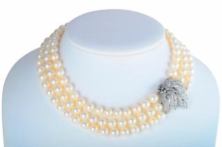 Appraisal: A Three Strand Pearl and Diamond Necklace Featuring three strands