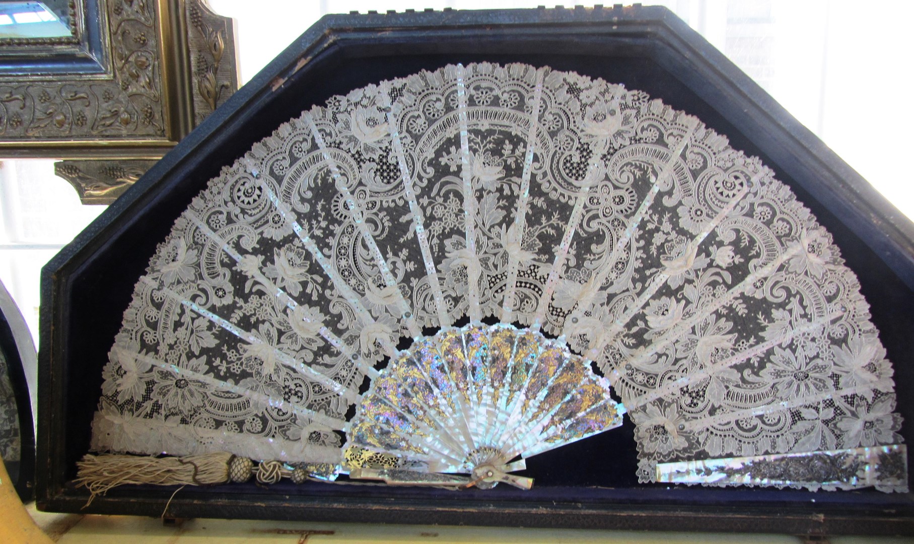 Appraisal: A Brussels lace fan early th century with gilt pierced