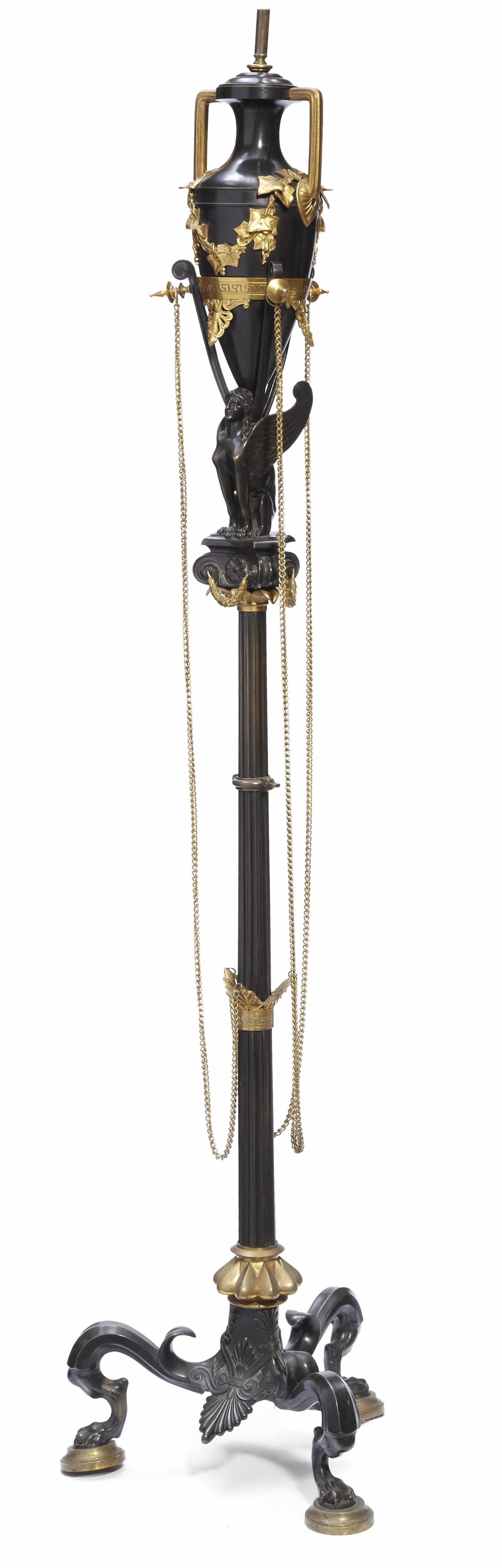 Appraisal: A French gilt and patinated bronze floor lamp late th